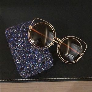 Sephora case and VYE sunglasses